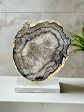 Load image into Gallery viewer, Polished Agate Geode Slice – Cream & Brown with Gold Electroplated Edge