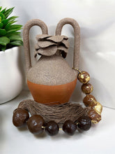 Load image into Gallery viewer, Two-Tone Brazilian Vase with Sculpted Lid, Tassel, and Gilded Beads
