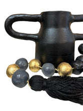 Load image into Gallery viewer, Black Clay Brazilian Vase with Gold &amp; Slate Tassel Beads
