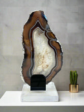 Load image into Gallery viewer, Polished Agate Slice with Silver Electroplated Edge on Lucite Base
