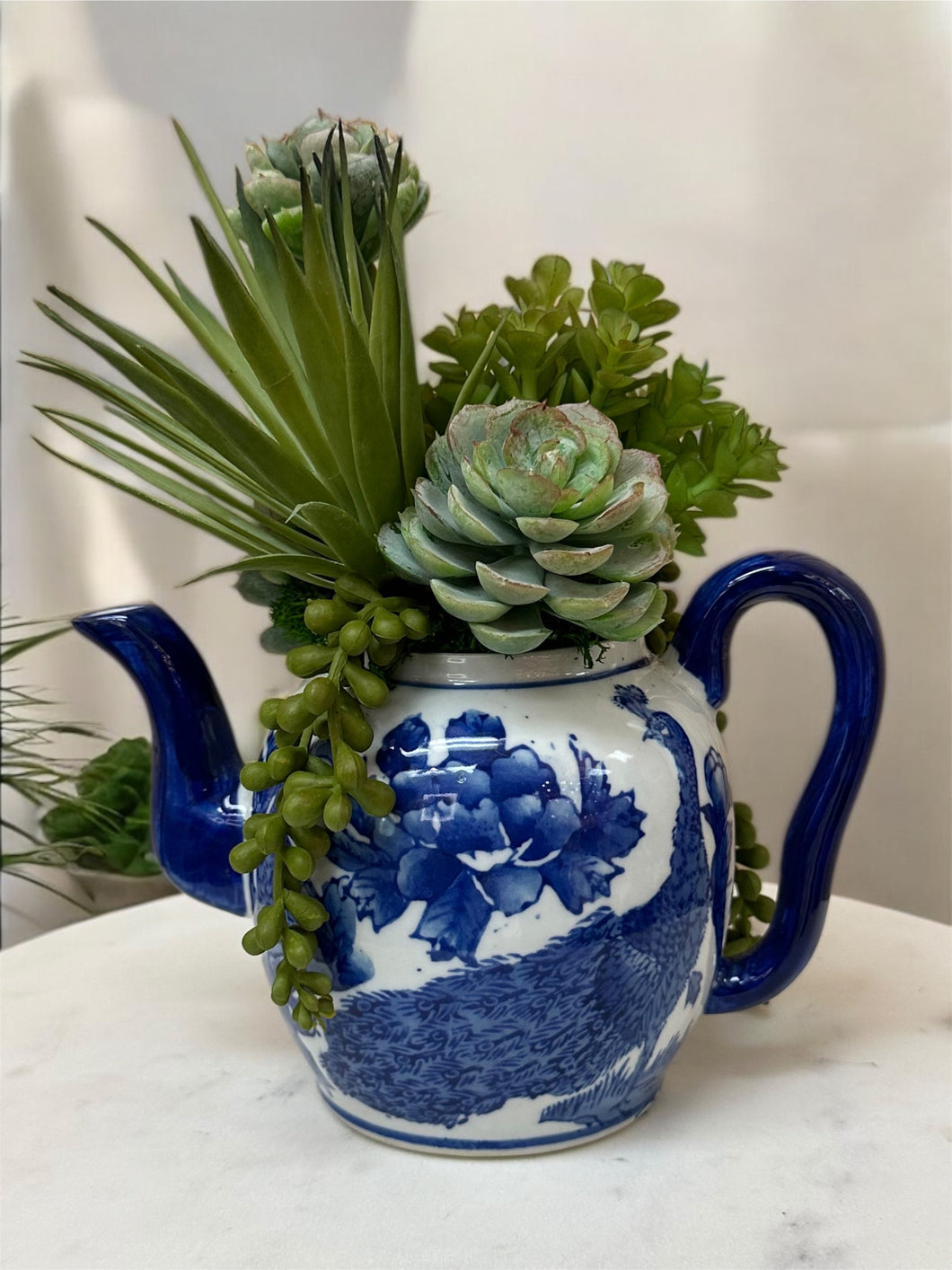 Vintage Blue & White Teapot with Faux Succulents – Whimsical Botanical Accent