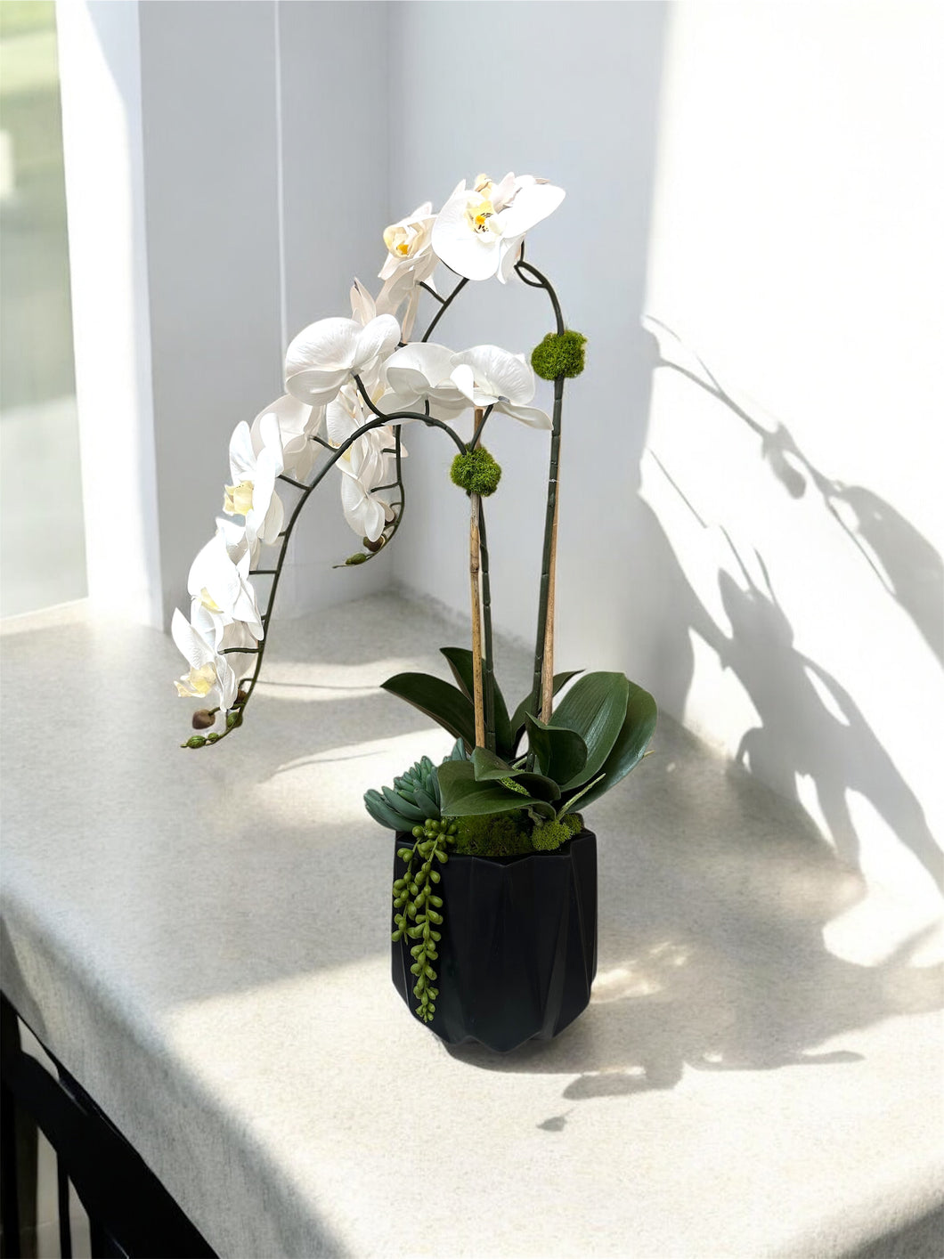 White Orchid Drop in Faceted Black Vessel – Minimalist Faux Floral for Luxury Spaces
