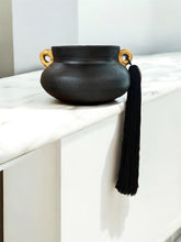 Load image into Gallery viewer, Black Brazilian Clay Vase with Gold Leaf and Silk Tassels
