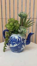 Load and play video in Gallery viewer, Vintage Blue &amp; White Teapot with Faux Succulents – Whimsical Botanical Accent

